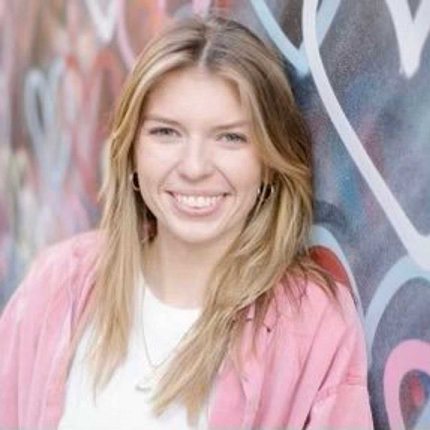 Portrait of CAROLINE RATEL, a professional stylist at Fringe Salon NY, showcasing their expertise and style.