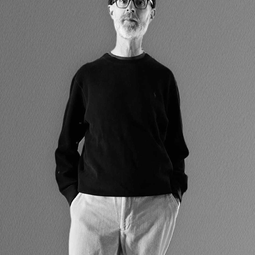 Portrait of KEVIN, a professional stylist at Fringe Salon NY, showcasing their expertise and style.