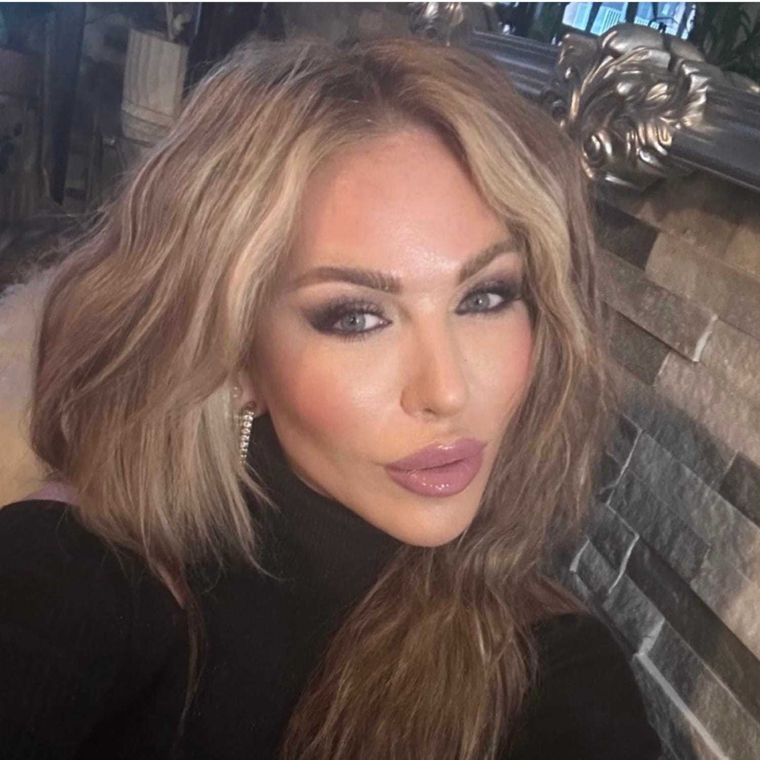 Portrait of ADRIANA, a professional stylist at Fringe Salon NY, showcasing their expertise and style.