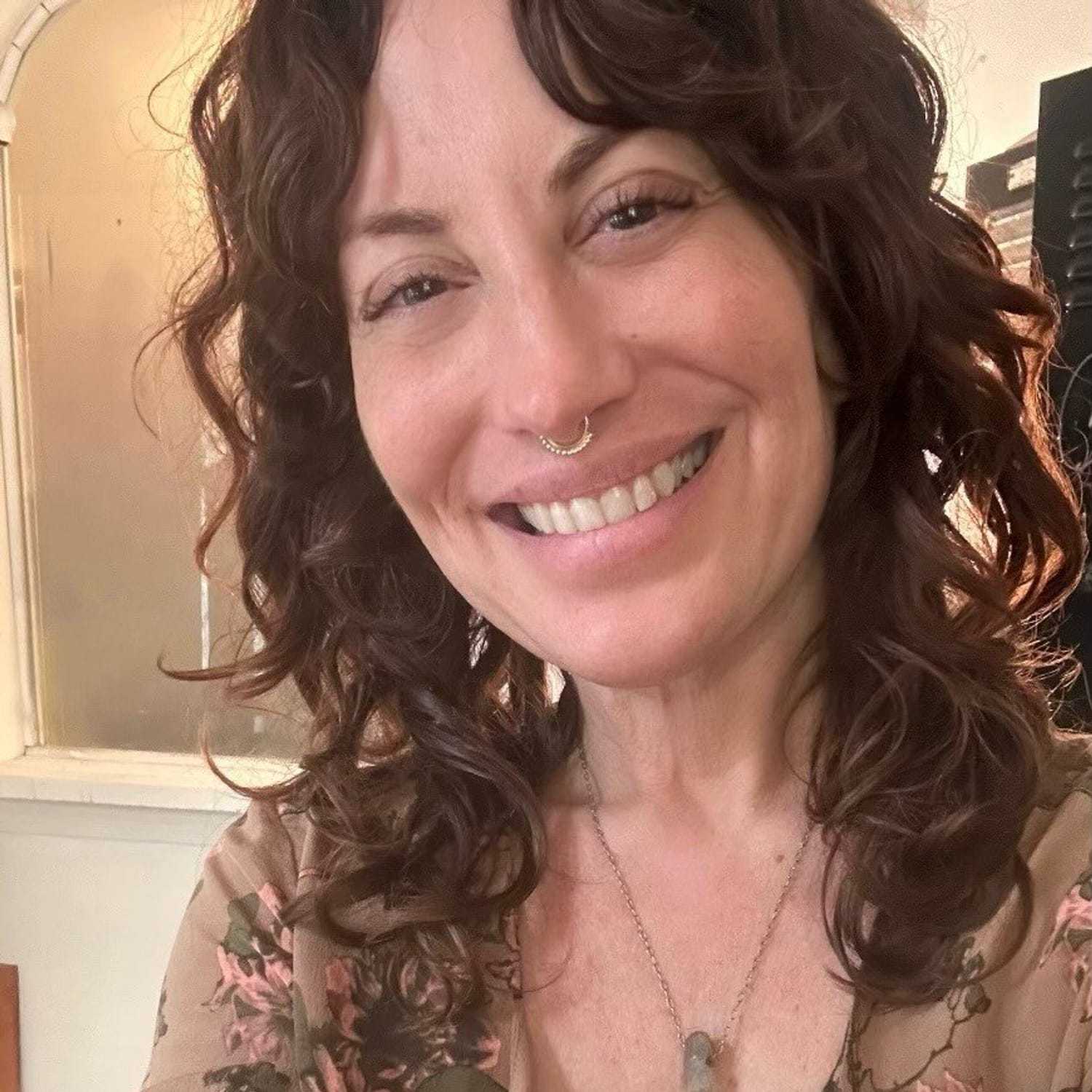 Portrait of AMY SCHIAPPA, a professional stylist at Fringe Salon NY, showcasing their expertise and style.